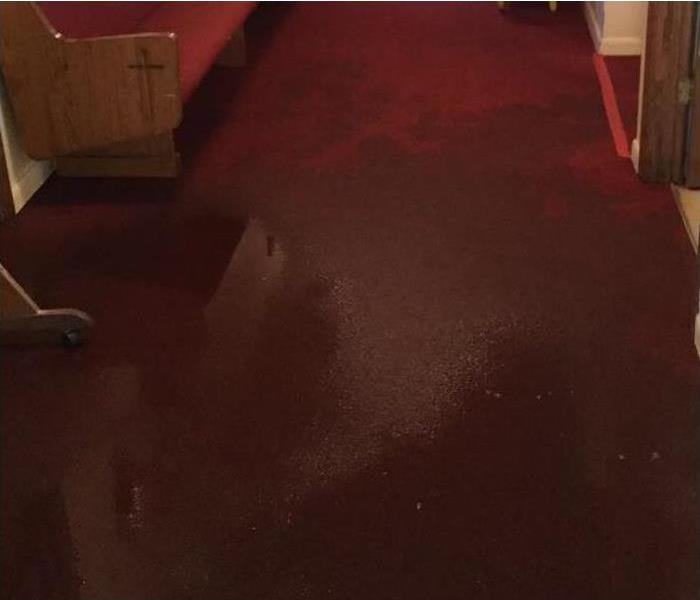 Standing water on carpeted floor